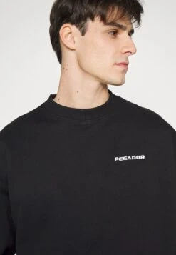 Pegador LOGO UNISEX - Sweatshirt - Black -Herrenbekleidung 3cffc5045e1441afb7c6cb3410343c23