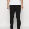 Ellesse TYPIC - Jogginghose - Black 1 Ellesse TYPIC - Jogginghose - Black -Herrenbekleidung 80e439ae60794ac0a96e4716527a574a