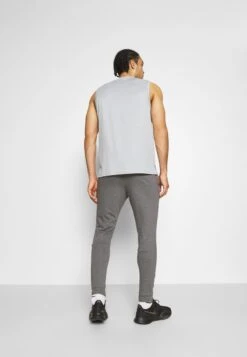 Nike Performance PANT TAPER - Jogginghose - Charcoal Heather/black -Herrenbekleidung c54f95c2adce41f5a2a15c79d46a0a43
