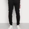 Alpha Industries JOGGER TAPE - Jogginghose - Black -Herrenbekleidung c8e1881df1c6403890310b163e5da0ad