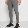 Nike Performance PANT TAPER - Jogginghose - Charcoal Heather/black -Herrenbekleidung e5fa6fdc215844b89d7f0aeb3fbae0de